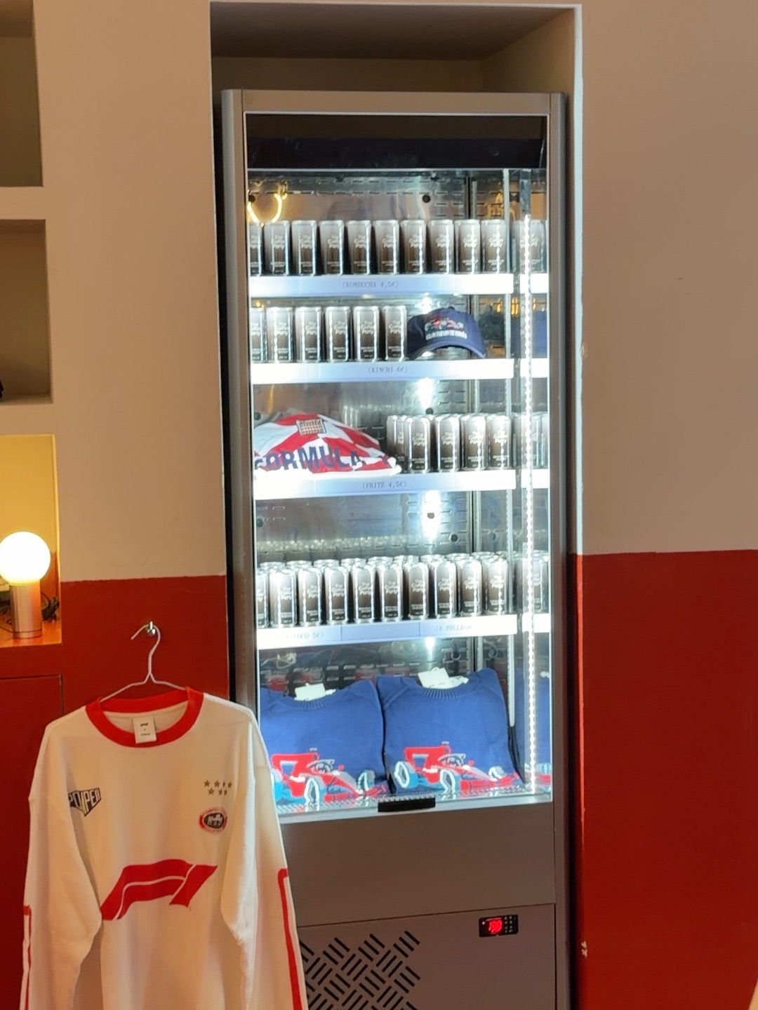 The Coffee Party cans in the display fridge at ACID Bakehouse in Madrid